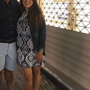 Short sleeve navy and white shift dress.